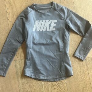 Nike Dri fit long sleeve fleece cold weather top. Kids size XL. Never worn. NWOT